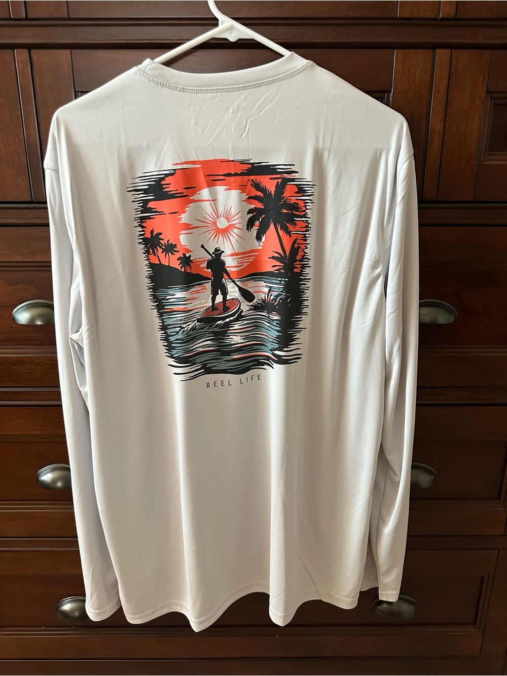Men's Reel life  Long Sleeve Sunset Paddle Tee - White with Coral Graphic NWOT